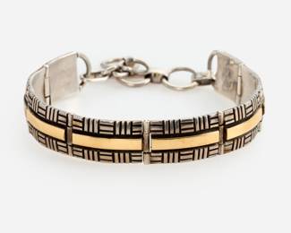 142. Navajo Herbert Begaye Bracelet: Sterling + 14k
