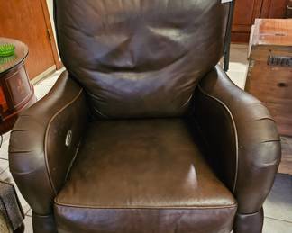 The second Motioncraft Recliner in brown leather. 
So very comfortable and not huge. 
