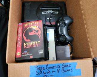 Saga Genesis game console with 8 games $100.