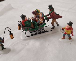 Dept 56 Caroling with the Cratchit family