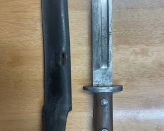 WWI US Military Dagger with orig, Scabbard measures 11" from the tip of handle to the tip of the blade. The Blade is marked on one side with US and the other side with 1900. Quite a piece!