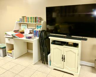 Desk with top shelf, vintage books, office supplies, folding table & 4 chairs, Flat Screen TV, 2 drawer entertainment stand, many DVD's