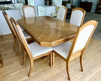 Dining room table with 2 extra leaves, 8 chairs (6 pictured), Made in Canada (excellent condition)