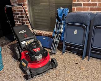 Push lawnmower, Folding table and chairs, flower pot