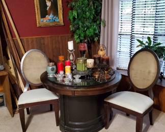 Round drum table /game table set.  Chip and dale chairs, assorted candles and holders. Vintage Gold framed Renoir portrait De Jeune Fille, rare flawless reproduction