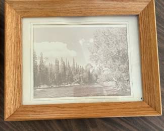34. Landscape in brown wood frame  $20.00