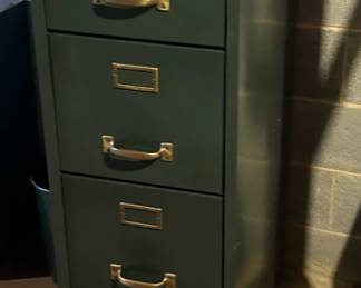 24. 4 Drawer Green File Cabinet.  $45.00. PENDING