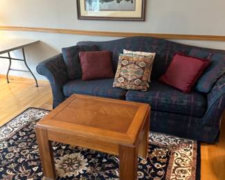 rug, coffee table, framed art