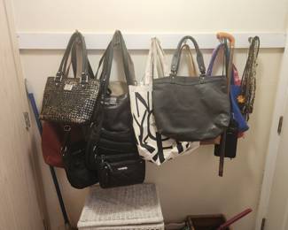 assortment of nice hand bags