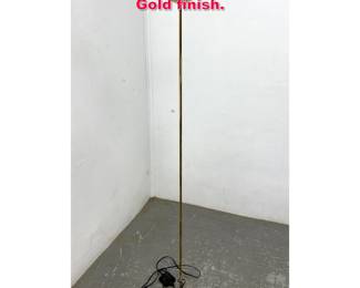 Lot 379 George Kovacs floor lamp. Gold finish.