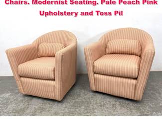 Lot 480 Pr Barrel Back Swivel Club Lounge Chairs. Modernist Seating. Pale Peach Pink Upholstery and Toss Pil