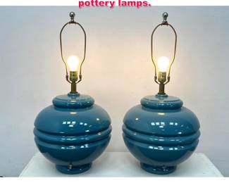 Lot 291 Pair HAEGER teal green pottery lamps.