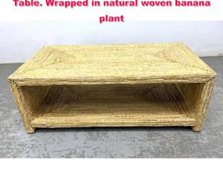 Lot 562 UTTERMOST Rora Open Coffee Table. Wrapped in natural woven banana plant