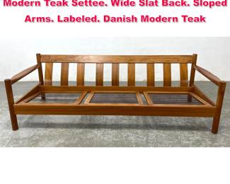 Lot 470 BERNSTORFFSMINDE Danish Modern Teak Settee. Wide Slat Back. Sloped Arms. Labeled. Danish Modern Teak