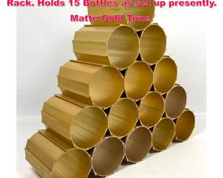 Lot 184 Modular Colored Aluminum Wine Rack. Holds 15 Bottles as set up presently. Matte Gold Tone.