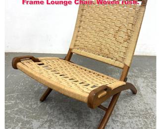 Lot 269 Hans Wegner style Folding Wood Frame Lounge Chair. Woven rush.