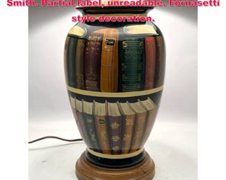 Lot 382 Book lamp in the style of Maitland Smith. Partial label, unreadable. Fornasetti style decoration.