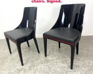 Lot 142 Pr Roche Bobois black lacquer chairs. Signed.