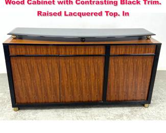 Lot 292 Credenza Cabinet. Nicely Grained Wood Cabinet with Contrasting Black Trim. Raised Lacquered Top. In