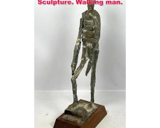 Lot 209 Heavy Welded Brutalist Figural Sculpture. Walking man.