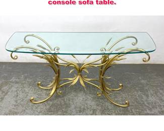 Lot 567 Gold tone floral Iron and glass console sofa table.