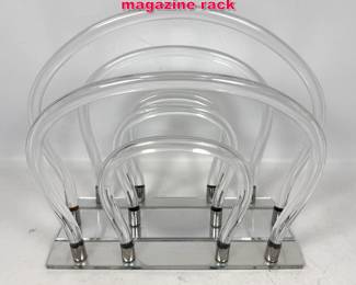 Lot 134 Dorothy Thorpe style lucite magazine rack