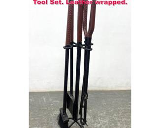 Lot 252 MICHAEL ARAM Designer Fireplace Tool Set. Leather wrapped.