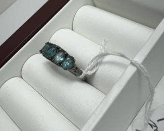 925 Sterling silver ring with pale blue topaz topaz stones. all gemstones and metals have been tested. using the Presidium two gemstone detector