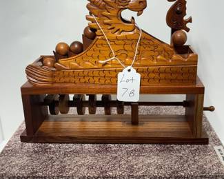 articulating carved wooden Chinese display piece. dragon moves and balls cascade. rare starfish edition. box included