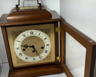 two jewel mantle clock, chimes & comes with original wind up key.