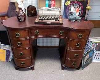 Kidney desk with multiple drawers