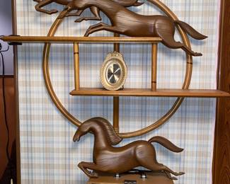 Round rattan wall shelf and set of Syroco horse wall art