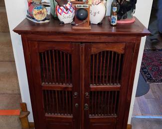Wooden chest with wooden dowel design doors