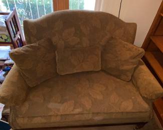 2 seat loveseat… grab a book , a blanket and a bottle of wine …. Relax in comfort !