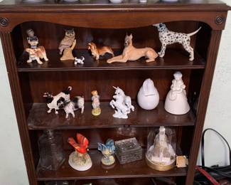 Bookshelf full of small home decor items