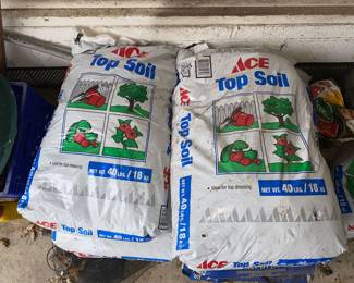Multiple bags of top soil