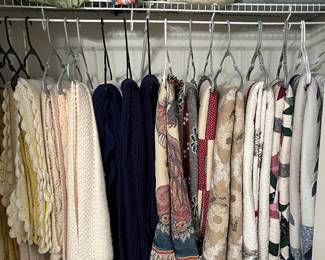 Machine made quilts, hand crocheted blankets