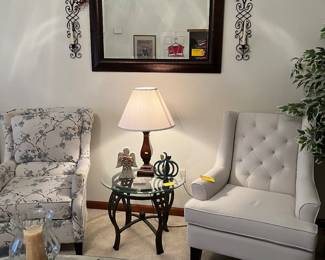 Glass top coffee table, side table,
Upholstered chairs- I think the one with the blue is a recliner. 