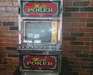 Video poker game with keys & stand