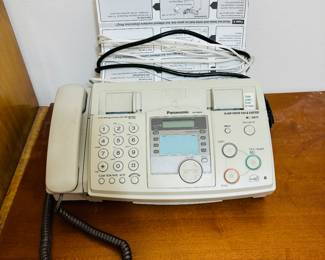 Yes, it is a fax machine.  Call the Smithsonian.  