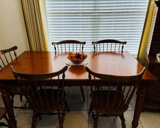 Dining table when guests arrive.  Otherwise, never used.