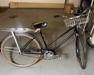Vintage Schwinn Touring Bicycle With Front Basket And Rear Luggage Platform