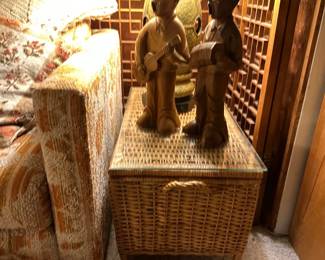 Wooden figurines; wicker chest