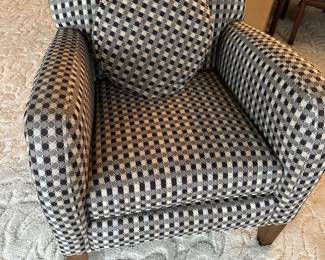 Checkered cushioned armchair