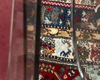 VERY difficult to see but the Kartell stamp on the ghost chair.