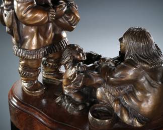 Mary Regat Eskimo Family Bronze Sculpture 

