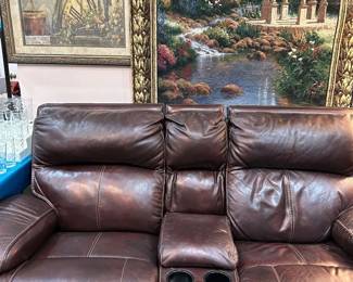 LEATHER LOVESEAT BOTH ENDS ROCK AND RECLINE - CENTER STORAGE AND CUP HOLDER