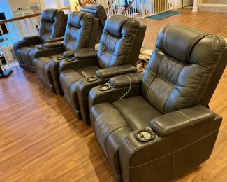 4 lether power recliners w/ adjustable headrests and USB ports