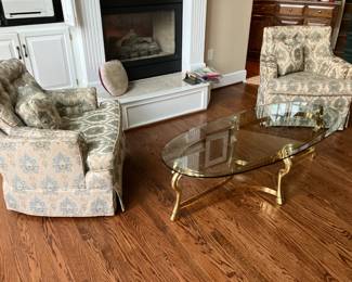 2 chairs w beige upholstery, brass and glass coffee table