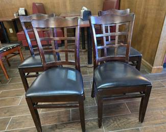 (4) Dark Wood Chairs W/ Black Vinyl Seat